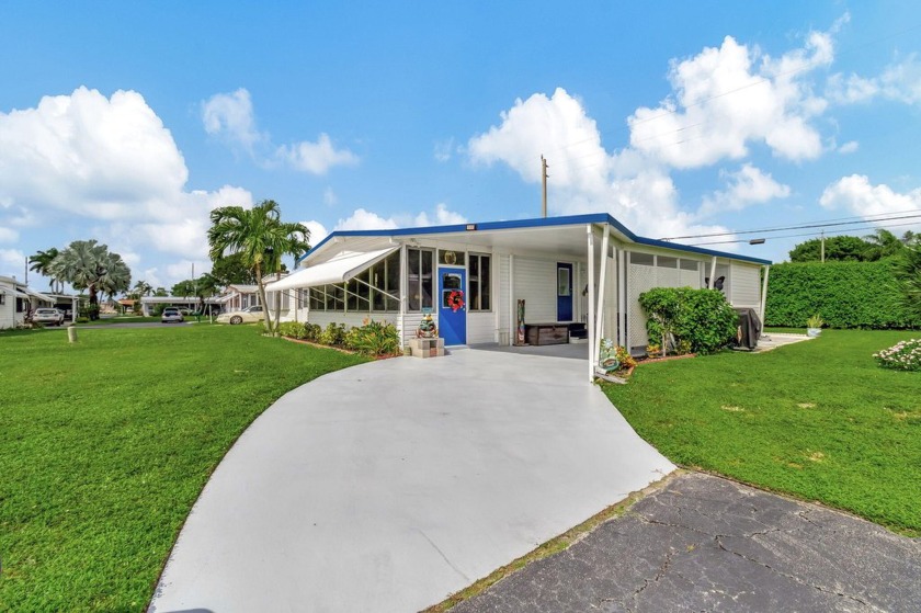 Welcome to Jamaica Bay, a highly desirable 55+ gated mobile home - Beach Home for sale in Boynton Beach, Florida on Beachhouse.com