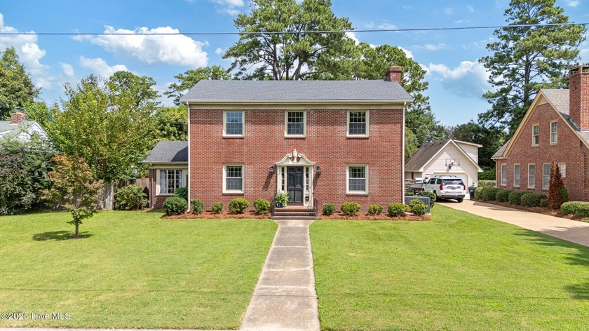 Just steps from the Pasquotank River, this timeless brick - Beach Home for sale in Elizabeth City, North Carolina on Beachhouse.com