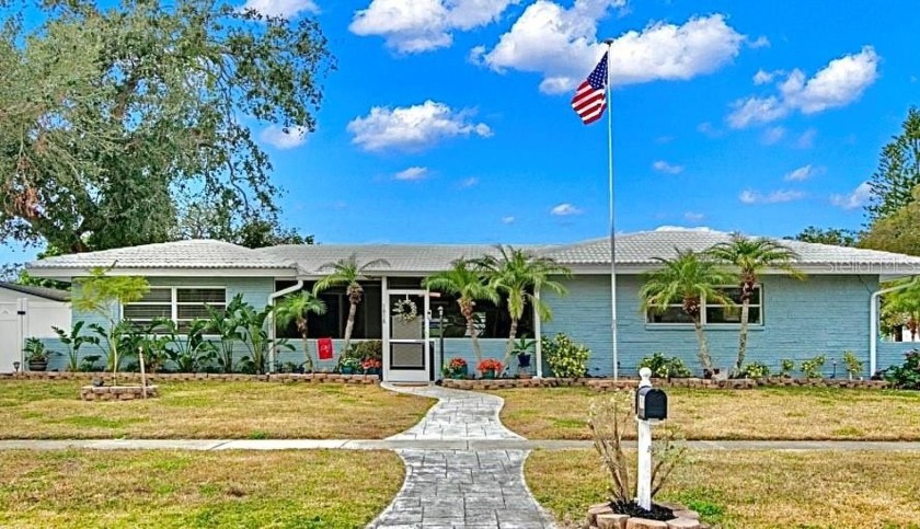 Start 2025 off right, in this move-in ready coastal ranch style - Beach Home for sale in Clearwater, Florida on Beachhouse.com