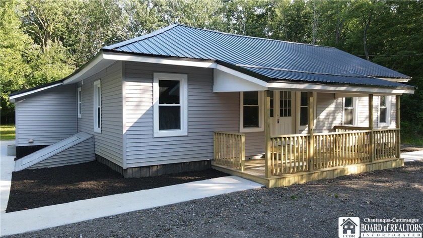 Welcome to your dream home in the heart of Sheridan! Nestled on - Beach Home for sale in Dunkirk, New York on Beachhouse.com