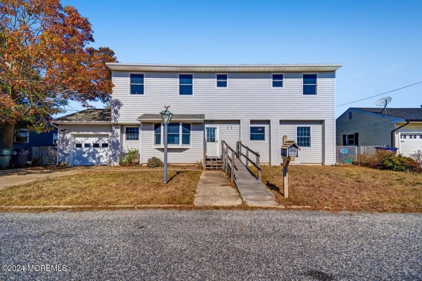 Welcome to this spacious 5-bedroom, 3-bath waterfront home - Beach Home for sale in Little Egg Harbor, New Jersey on Beachhouse.com