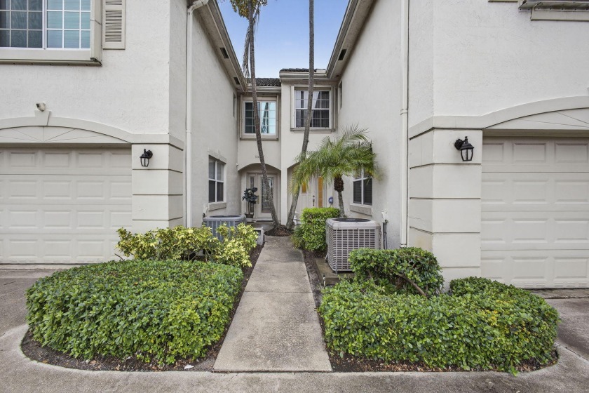 PRICE REDUCED! Vacant and move-in ready, this well-kept Golf - Beach Townhome/Townhouse for sale in Palm Beach Gardens, Florida on Beachhouse.com