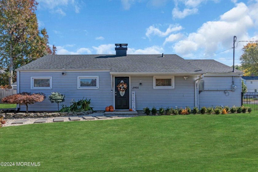 Nestled in a picturesque, sought-after neighborhood, this - Beach Home for sale in Oakhurst, New Jersey on Beachhouse.com