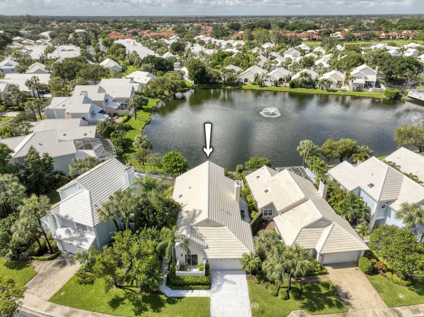 This stunning home has it all! The fully renovated interior - Beach Home for sale in Palm Beach Gardens, Florida on Beachhouse.com