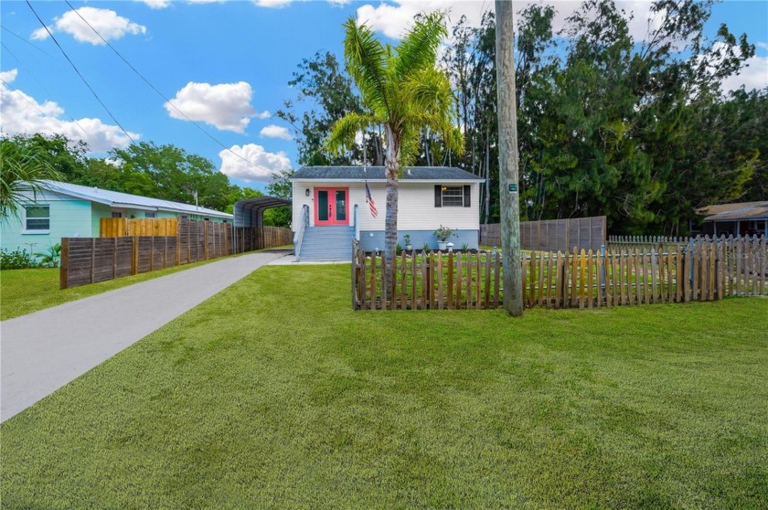 This beautifully renovated waterfront bungalow offers a perfect - Beach Home for sale in Ruskin, Florida on Beachhouse.com
