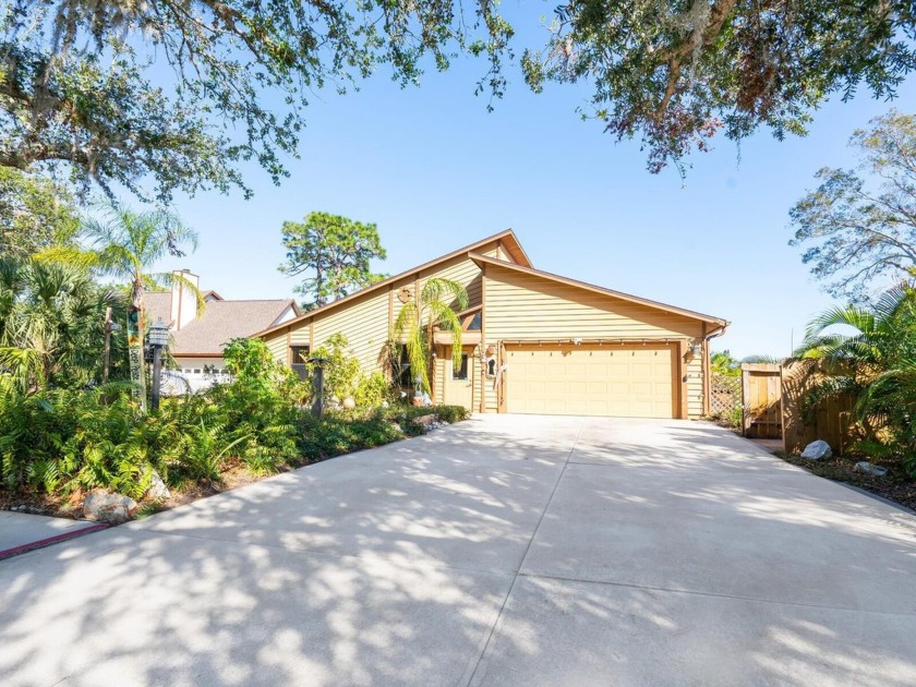 Beautiful lake views and charm abound in this home on a quiet - Beach Home for sale in Sarasota, Florida on Beachhouse.com