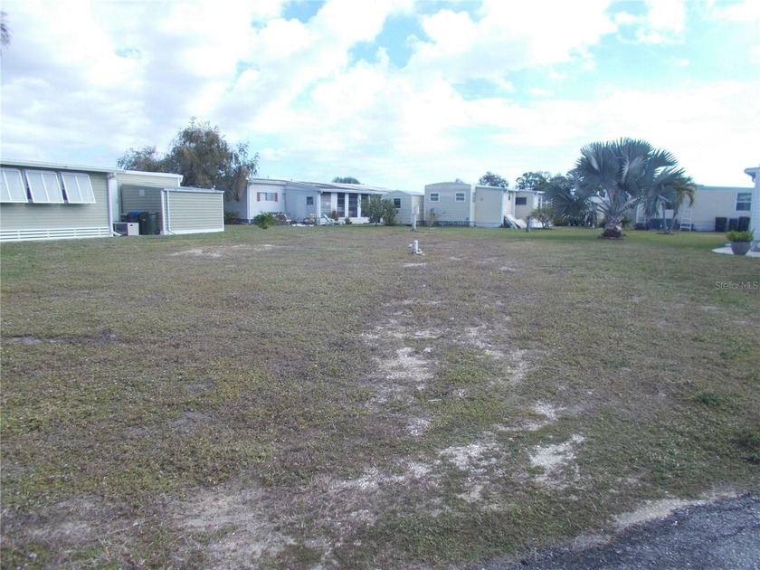 VACANT LAND in the sought after Gated Community of Holiday Park - Beach Lot for sale in North Port, Florida on Beachhouse.com