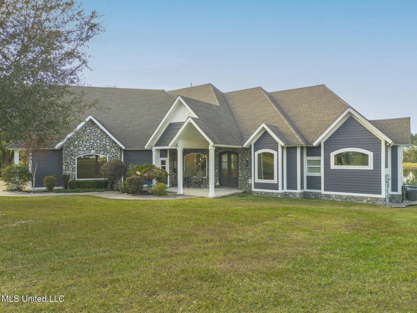 Lakefront Luxury Meets Country Charm on 4.75 Acres in Gulfport! - Beach Home for sale in Gulfport, Mississippi on Beachhouse.com