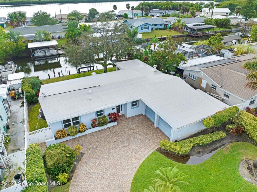 From the lush landscaping to the immaculate updates this home - Beach Home for sale in Merritt Island, Florida on Beachhouse.com