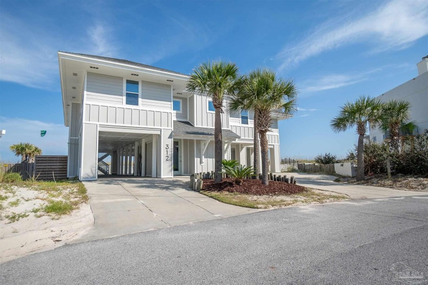 Located on the picturesque white sands of Pensacola Beach, this - Beach Home for sale in Pensacola Beach, Florida on Beachhouse.com