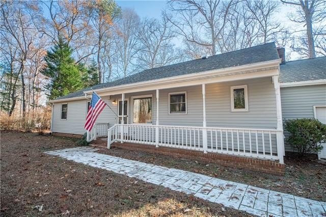 Gorgeous 1.68 acre setting on Burkes Mill Pond speckled with - Beach Home for sale in Gloucester, Virginia on Beachhouse.com