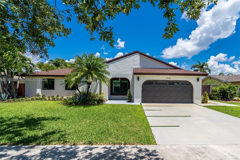 Welcome to this beautifully maintained 3-bedroom, 2-bathroom - Beach Home for sale in Cooper City, Florida on Beachhouse.com