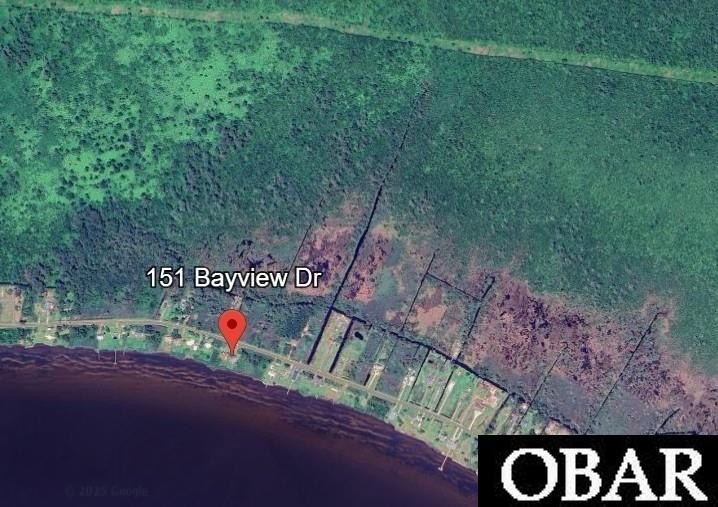 Snag this Serene Soundview 4 Acre Building Lot in the Village of - Beach Lot for sale in Stumpy Point, North Carolina on Beachhouse.com