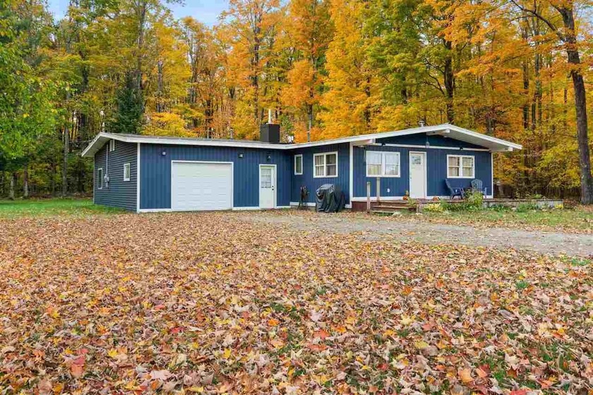 East of downtown Petoskey, this cozy 4 bedroom, 3 bathroom ranch - Beach Home for sale in Petoskey, Michigan on Beachhouse.com