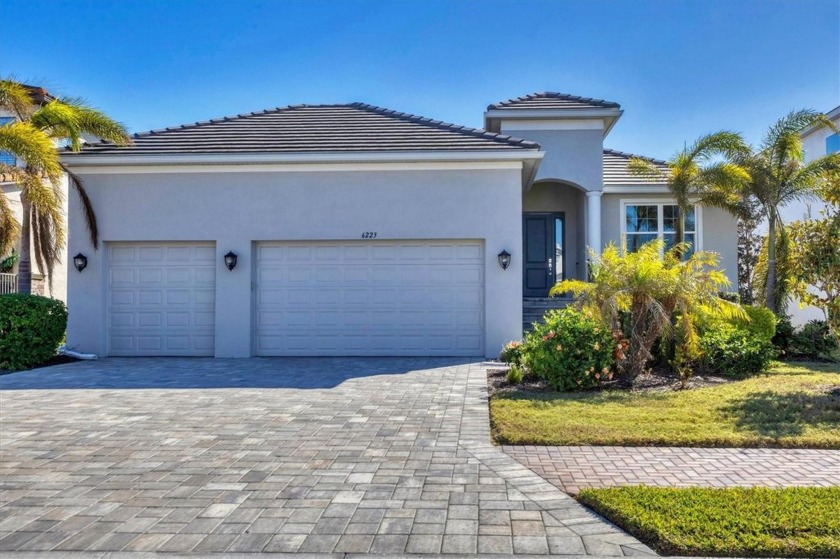 Welcome to a St Thomas lake-view model in the famous Legends Bay - Beach Home for sale in Bradenton, Florida on Beachhouse.com