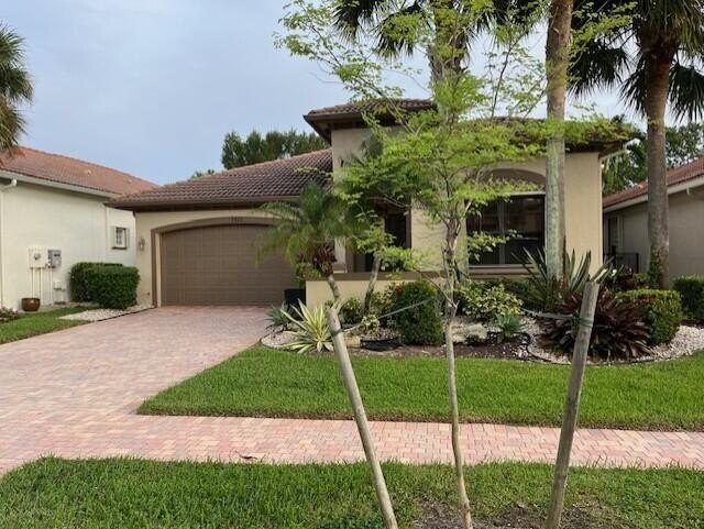 Extraordinary lake views from this enclosed,screened patio and - Beach Home for sale in Delray Beach, Florida on Beachhouse.com