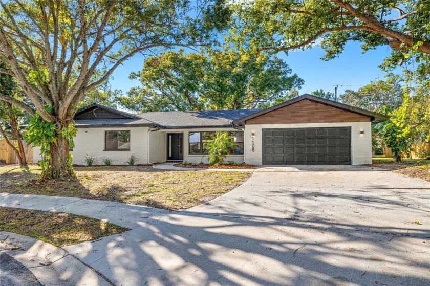 Sitting on over a quarter of an acre, this 3 bed, 2 bath home - Beach Home for sale in Clearwater, Florida on Beachhouse.com