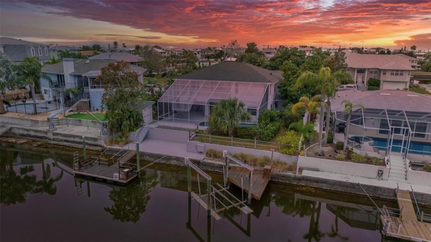 ELEVATED HOME, SCREENED IN POOL, 10K BOAT LIFT, FLOATING DOCK - Beach Home for sale in Hernando Beach, Florida on Beachhouse.com