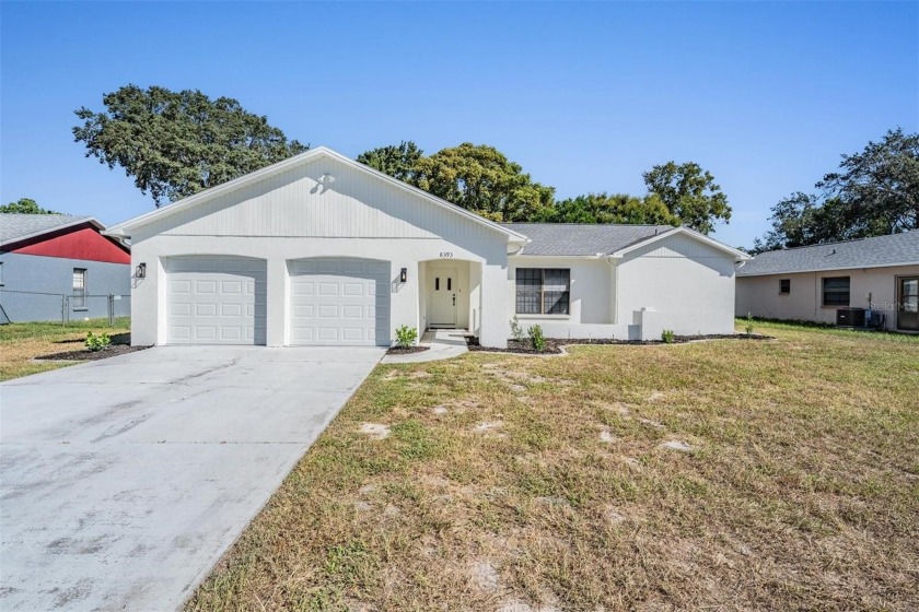 **Beautifully Updated Spring Hill Pool Home! BRAND NEW AC SYTEM - Beach Home for sale in Spring Hill, Florida on Beachhouse.com