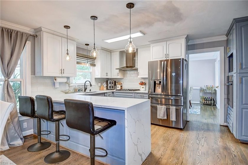 This beautifully updated 4-bedroom, 2.5-bath home offers - Beach Home for sale in Chesapeake, Virginia on Beachhouse.com