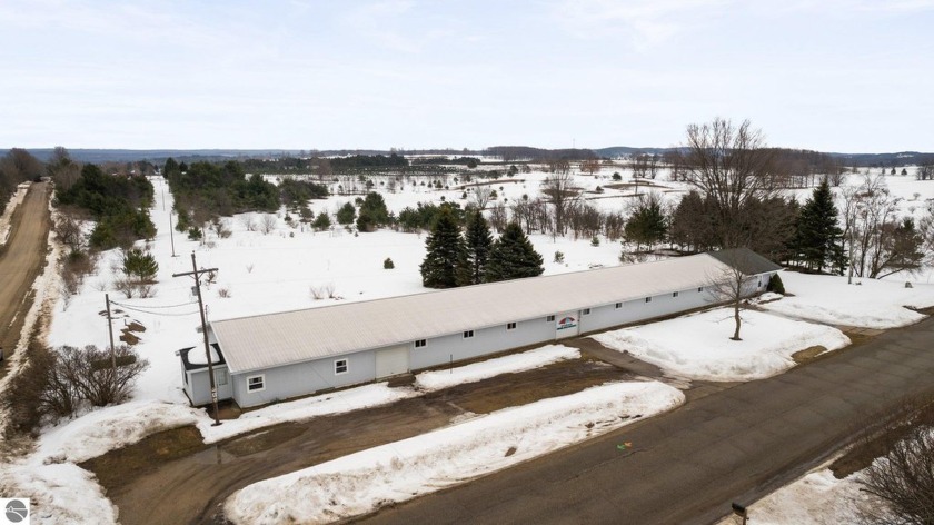 Versatile and income-producing, this unique property offers two - Beach Lot for sale in Alden, Michigan on Beachhouse.com