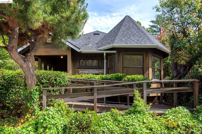 Opportunity knocks! This charming 1912 Craftsman home in the - Beach Home for sale in Oakland, California on Beachhouse.com