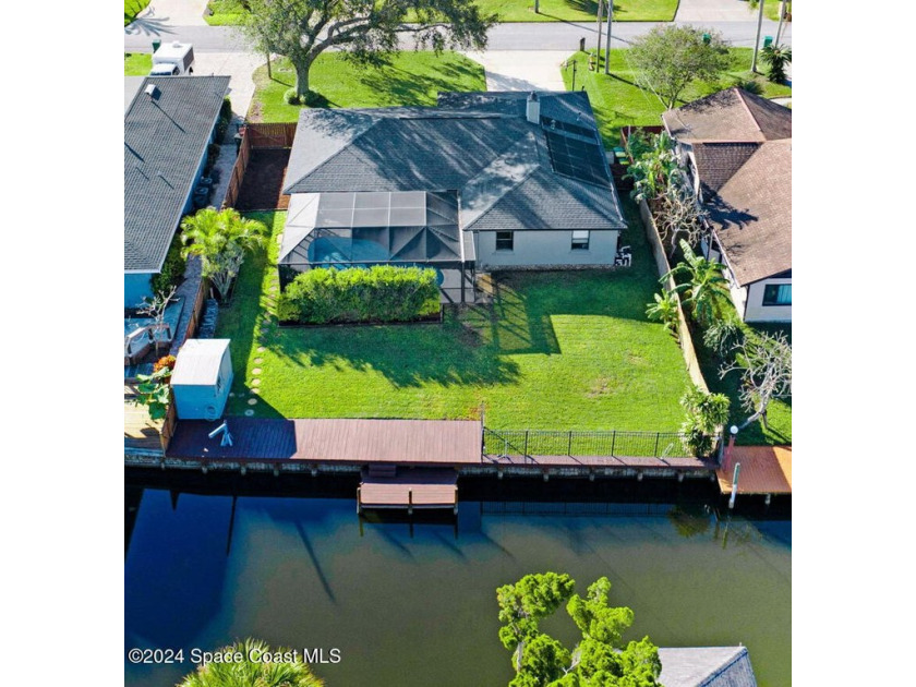 True Florida living in this beautifully remodeled deep-water - Beach Home for sale in Merritt Island, Florida on Beachhouse.com