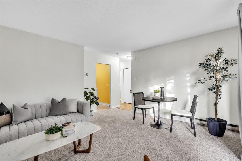 Students, First time buyers & Investors! Tucked away on a quiet - Beach Condo for sale in Saanich, British Columbia on Beachhouse.com