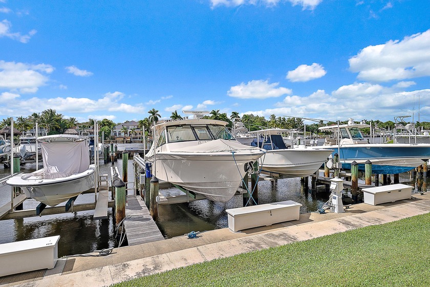 Rare deeded boat slip and 20,000-lb lift accommodating a 36-foot - Beach Lot for sale in Juno Beach, Florida on Beachhouse.com