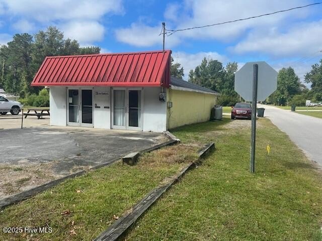 Prime commercial opportunity in the heart of Newport! These two - Beach Lot for sale in Newport, North Carolina on Beachhouse.com