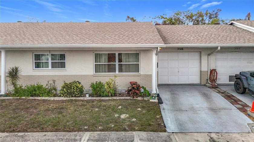 Dreaming of a serene lifestyle? This stunning home in a 55+ - Beach Home for sale in New Port Richey, Florida on Beachhouse.com