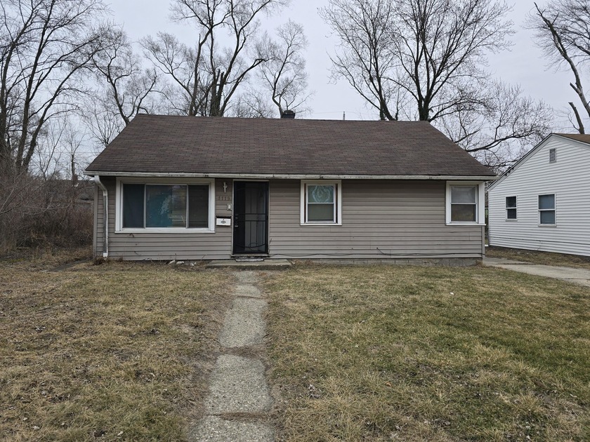 This inviting ranch-style home welcomes you with a bright and - Beach Home for sale in Gary, Indiana on Beachhouse.com