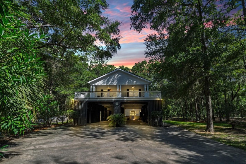 Welcome to your coastal oasis! Nestled on an elevated, wooded - Beach Home for sale in Edisto Island, South Carolina on Beachhouse.com