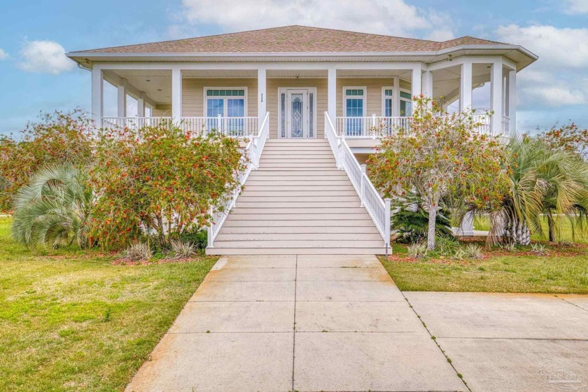 This beautiful Custom home has gorgeous water views of the Santa - Beach Home for sale in Gulf Breeze, Florida on Beachhouse.com