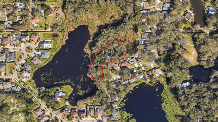 This wonderful pond/lakefront 1.77+- acre site is zoned RSC-4 - Beach Lot for sale in Tampa, Florida on Beachhouse.com