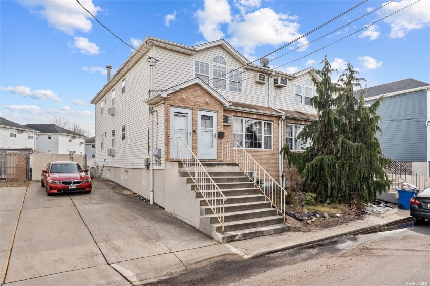 Introducing Beautiful 2 Family Brick Detached Property Delivered - Beach Townhome/Townhouse for sale in Howard Beach, New York on Beachhouse.com