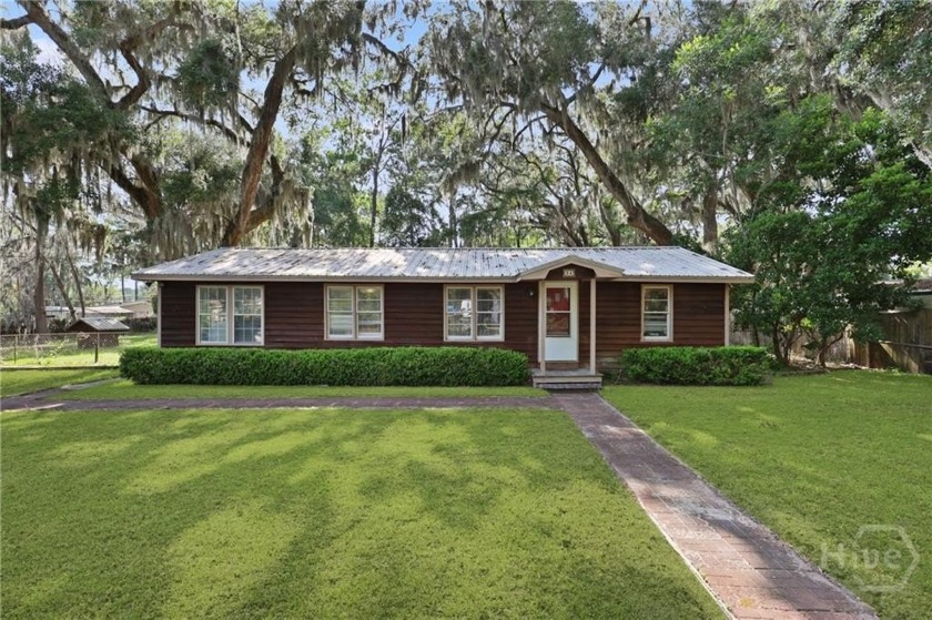 Welcome to this Charming 3 Bedroom 2 Bath Home Nestled on a - Beach Home for sale in Midway, Georgia on Beachhouse.com