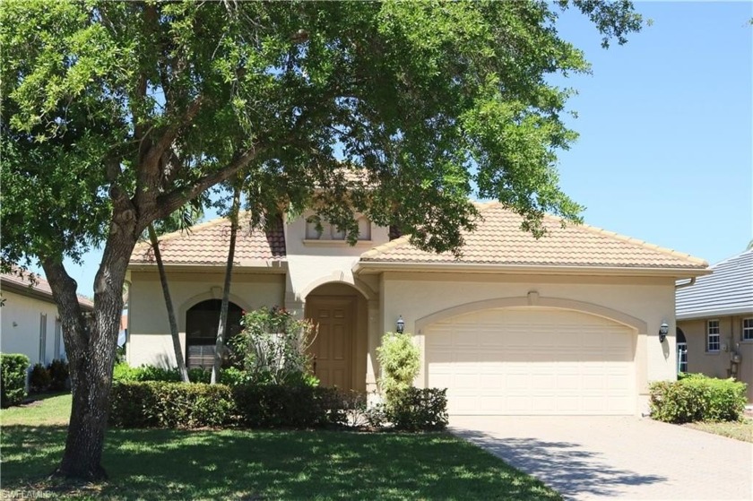 Nestled in a serene and sought-after neighborhood, this stunning - Beach Home for sale in Naples, Florida on Beachhouse.com