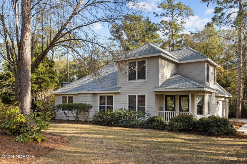 Drive down the most scenic tree-lined street in Pine Knoll - Beach Home for sale in Pine Knoll Shores, North Carolina on Beachhouse.com