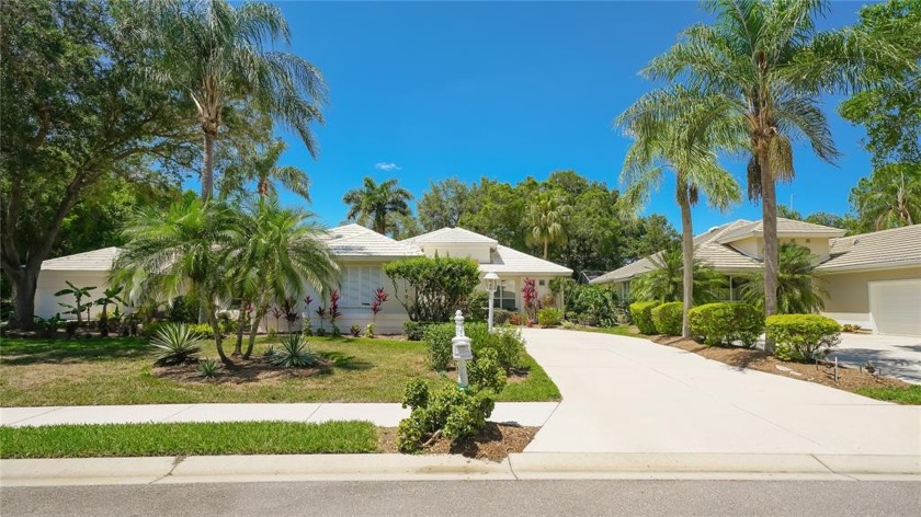 Enjoy tranquil lake and golf course views from this Bristol - Beach Home for sale in University Park, Florida on Beachhouse.com