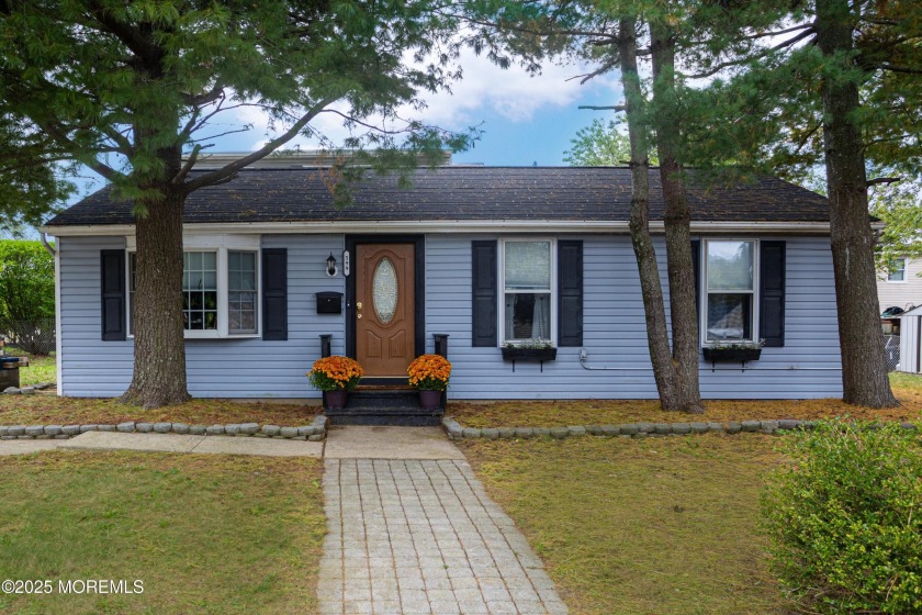 Nestled beneath mature pine trees, you'll find this charming 3 - Beach Home for sale in Keyport, New Jersey on Beachhouse.com
