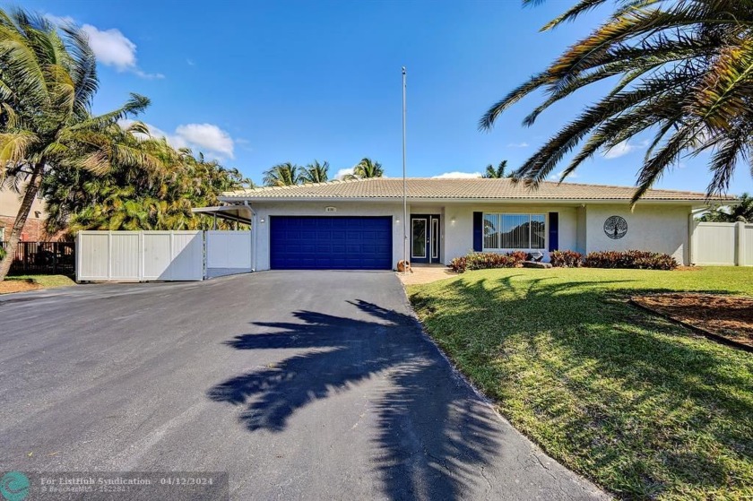 This captivating home sits on a spacious lot without HOA - Beach Home for sale in Davie, Florida on Beachhouse.com
