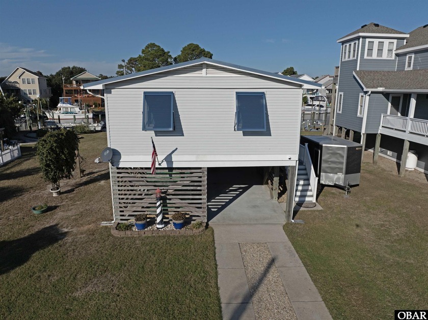Updated canalfront home in Colington Harbour with deep-water - Beach Home for sale in Kill Devil Hills, North Carolina on Beachhouse.com