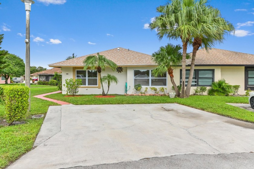 Welcome to this charming villa located in the desirable Garden - Beach Home for sale in West Palm Beach, Florida on Beachhouse.com