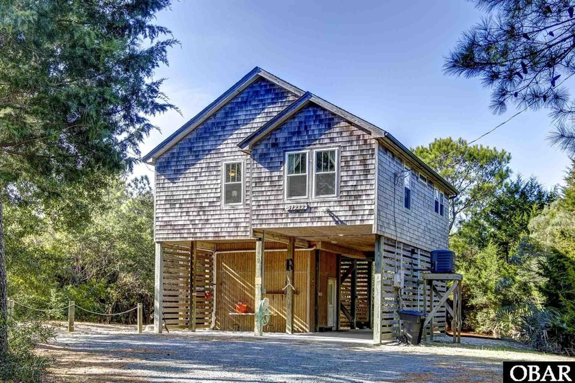 Welcome to a coastal dream retreat where immediate comfort meets - Beach Home for sale in Frisco, North Carolina on Beachhouse.com