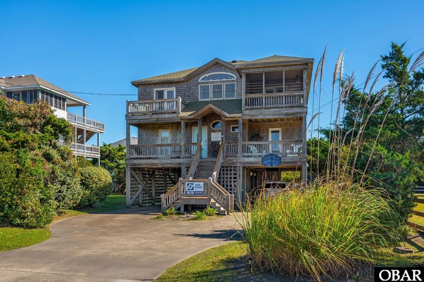 Tucked away in Hatteras Colony and sitting right between the - Beach Home for sale in Salvo, North Carolina on Beachhouse.com
