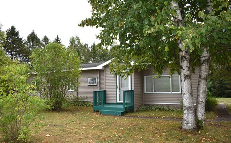 Extremely well cared for home has been in the family for a while - Beach Home for sale in Cheboygan, Michigan on Beachhouse.com