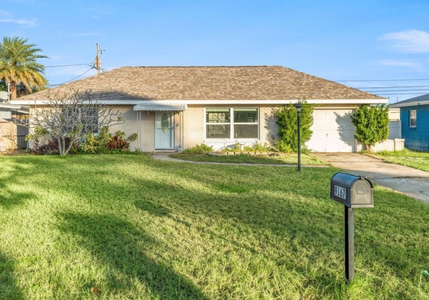 This inviting 3-bedroom brick home is nestled in the - Beach Home for sale in Seminole, Florida on Beachhouse.com