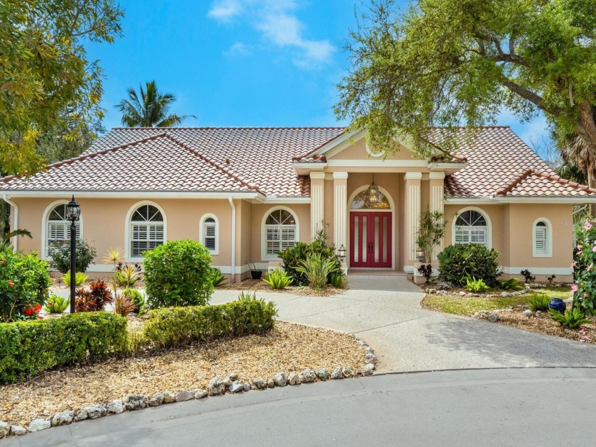 Custom Lake Front Country Club home! As you walk through the - Beach Home for sale in Englewood, Florida on Beachhouse.com