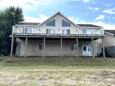 LARGE 2 BEDROOM HOUSE SITTING ON THE BAYOU OFF THE CHEBOYGAN - Beach Home for sale in Cheboygan, Michigan on Beachhouse.com